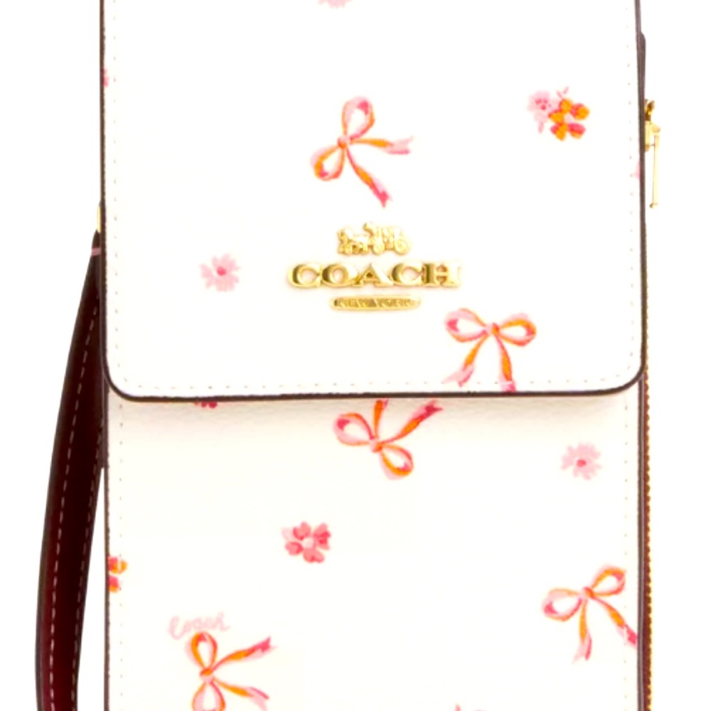 North South Phone Crossbody With Bow Print
COLOR: GOLD/CHALK/WINE MULTI